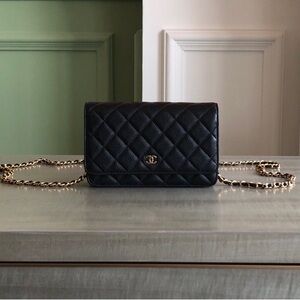 CHANEL Black Quilted Leather Wristlet with Gold Chain